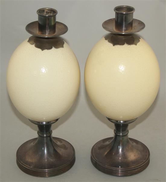 Anthony Redmile. A pair of ostrich egg candlesticks, 11in.